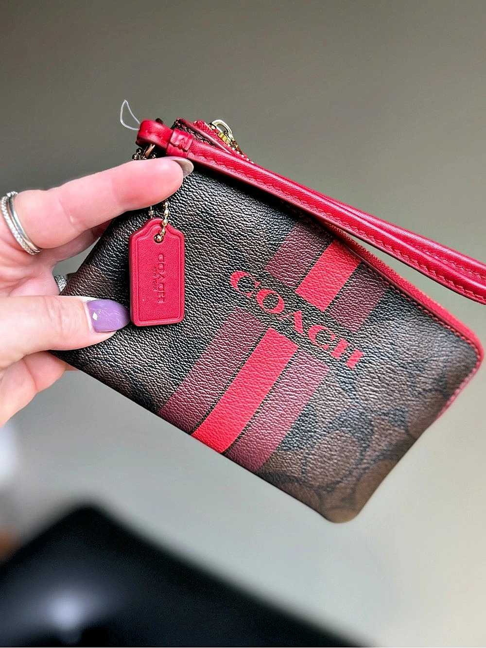 Coach Corner Zip Wristlet In Signature Canvas With Varsity Stripe Brown & Red